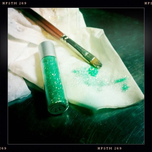 Apply loose glitter using a dry brush & press it into adhesive.